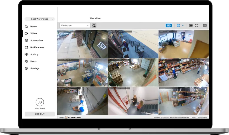 Alarm.com customer website showing a nine-camera video wall for an industrial site